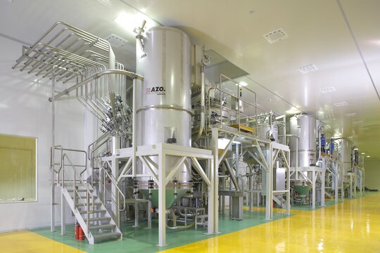 View at production area with vacuum mixer and conveyor scales